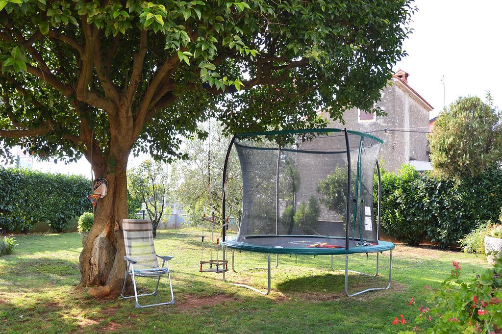 Giardino Apartment Umag Exterior foto